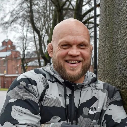 Mika "Immu" Ilmén hymyilee kuvassa.